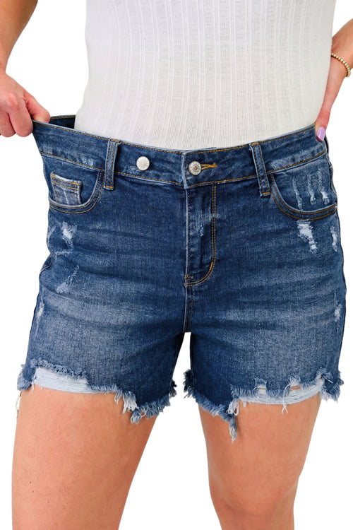 Distressed Whiskery Denim Shorts With Asymmetric Raw Hem